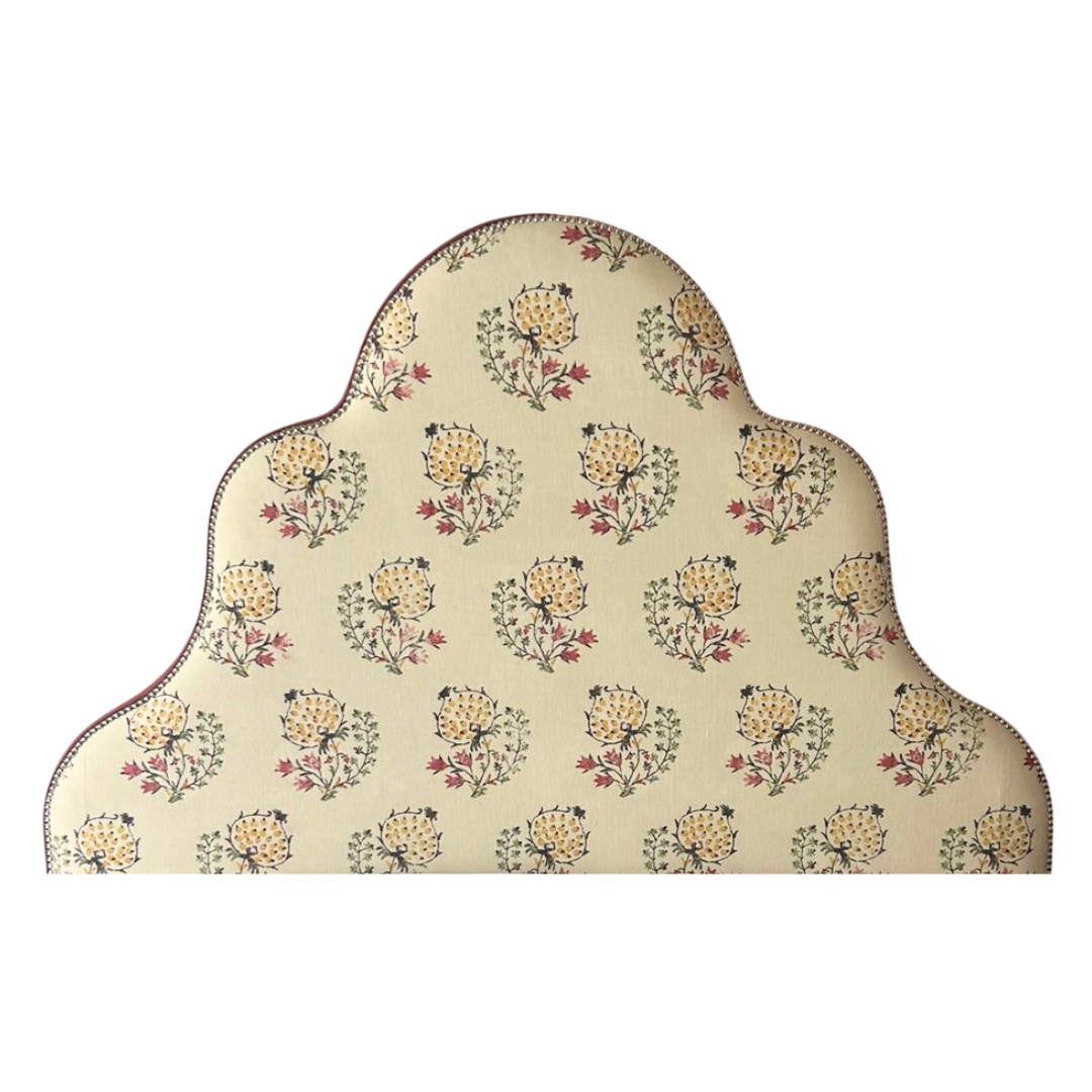 Decorative headboard with floral pattern on a white background