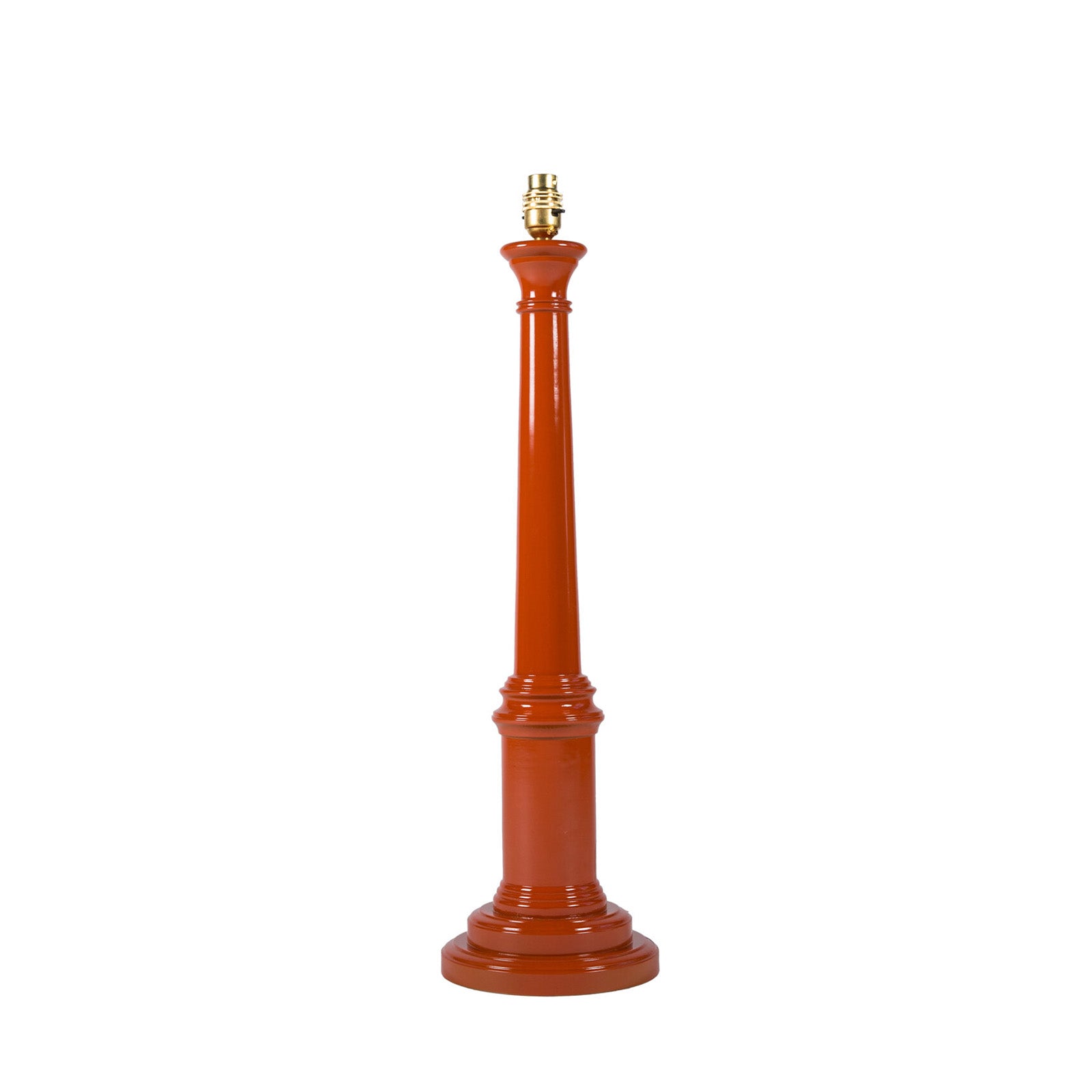 A wooden lamp base painted in a marmalade color with a high gloss lacquer finish, designed to accommodate a lampshade on top.