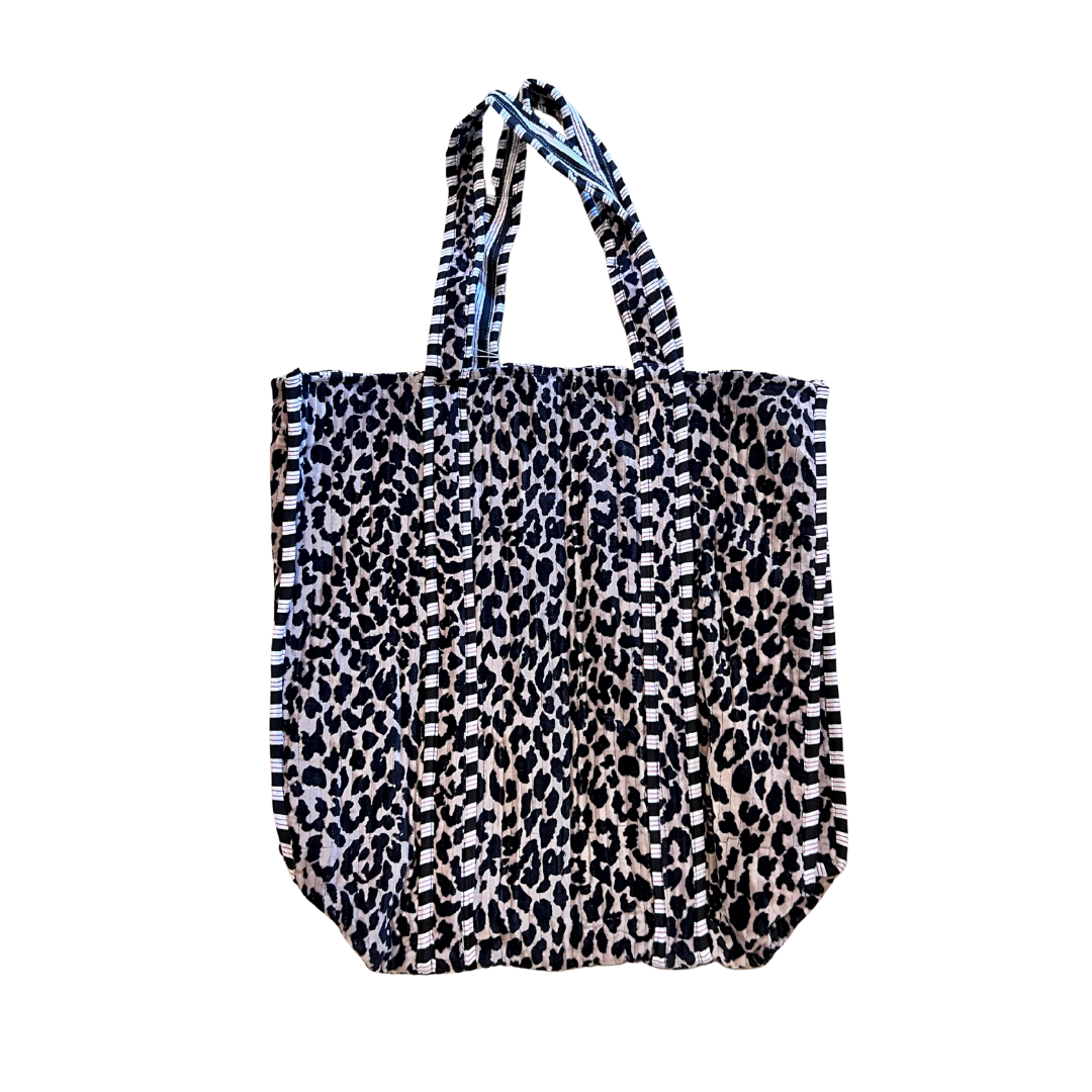 Leopard print tote bag on a white background