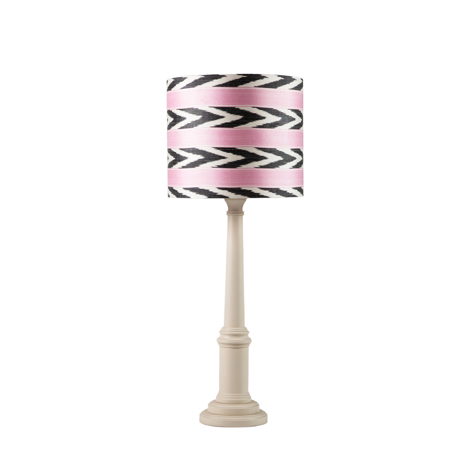 Simon Lamp in Calico with a pink and black striped shade on a white background