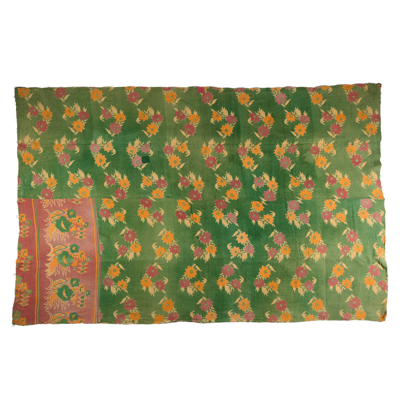 Large Multicoloured green and gold patterned bedspread.