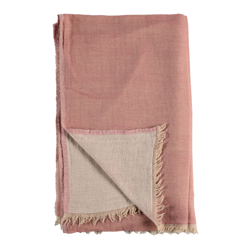 Large throw in blush with a cream back and fringe.