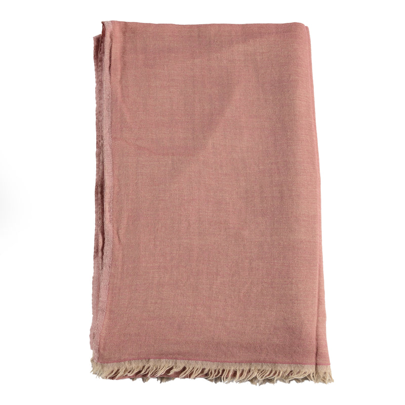 Large throw in blush with a cream back and fringe.