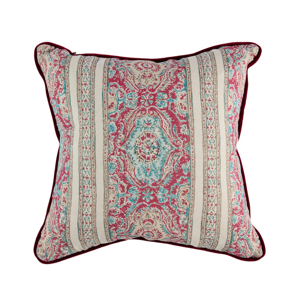 Pink and blue tapestry square cushion with velvet cherry piping.